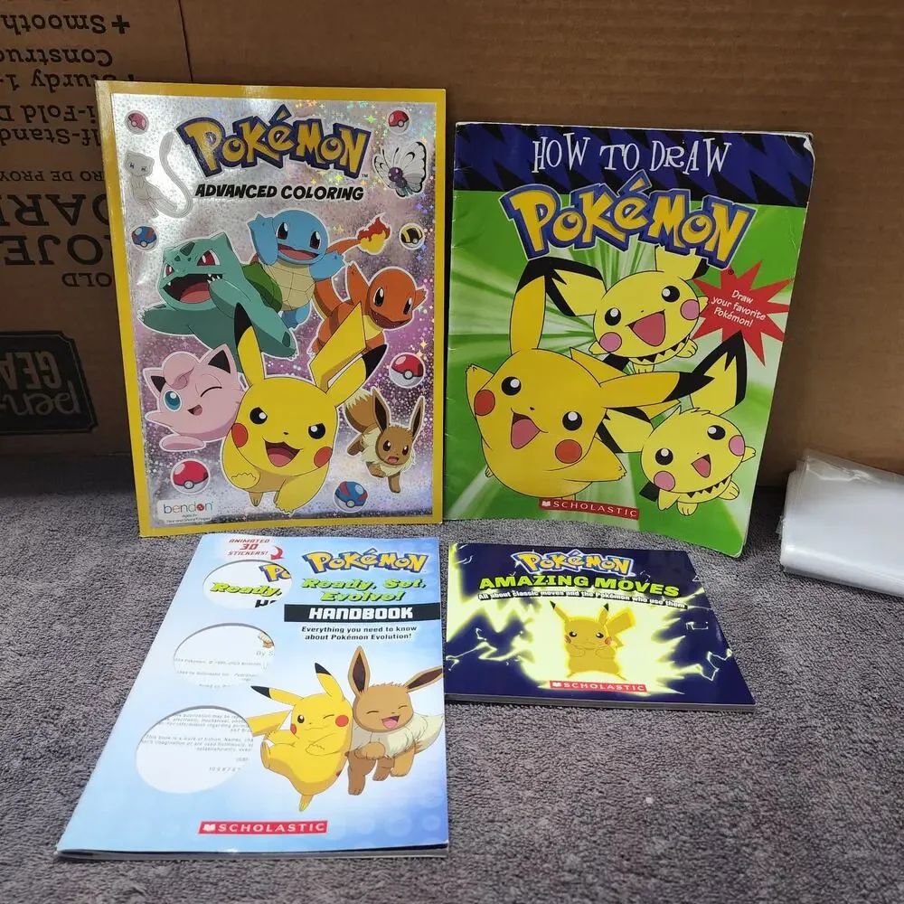 Various Pokemon Books some of the activity books have been used b49